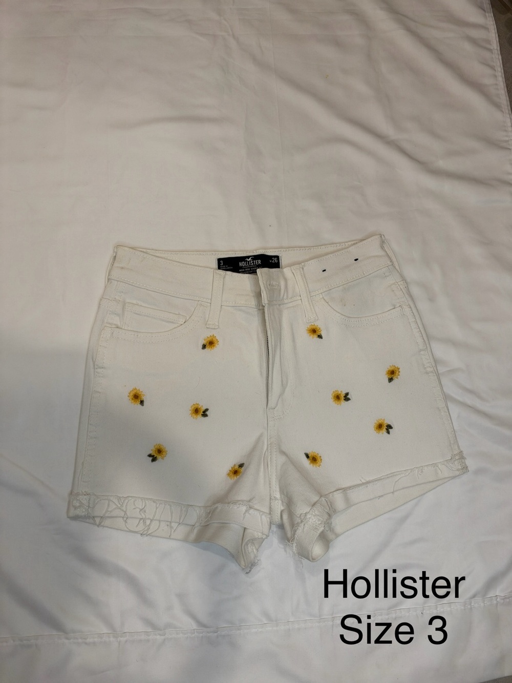 Hollister White Denim Shorts with Yellow Sunflower Embroidery